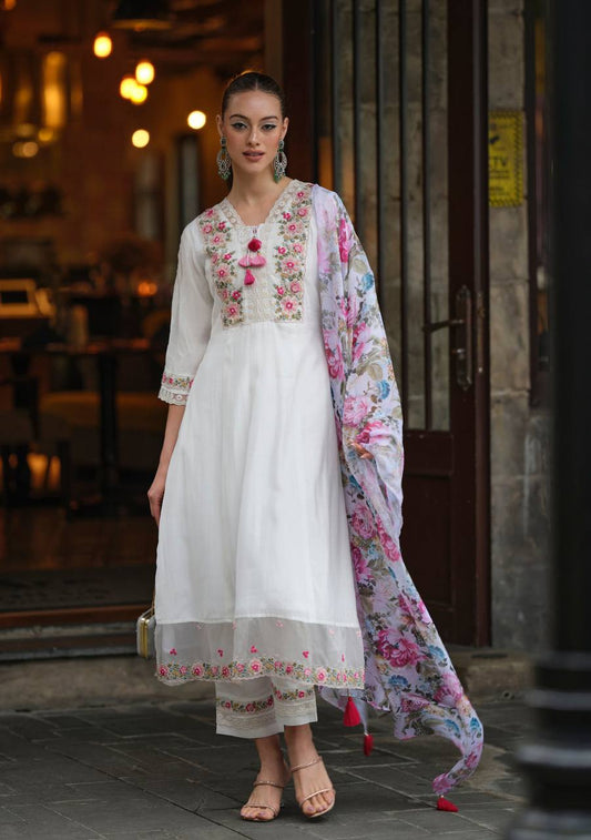 A floral kurti with pant and dupatta