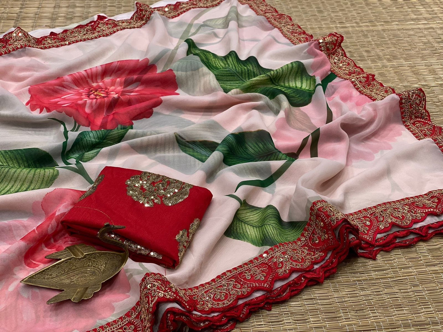 Pastel floral saree with lace border work with stitched blouse