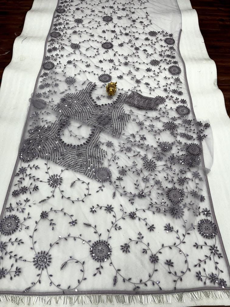 Exclusive Levender grey net saree with full sequins work on it with fully sticthed blouse