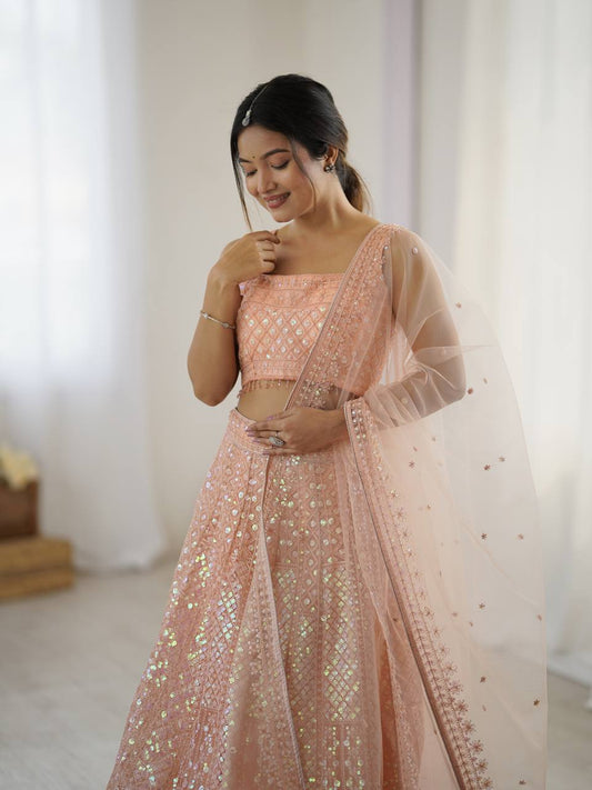 Kruti - Beautiful Pastel Peach Net Lehenga with Rainbow Sequins Fully Stitched