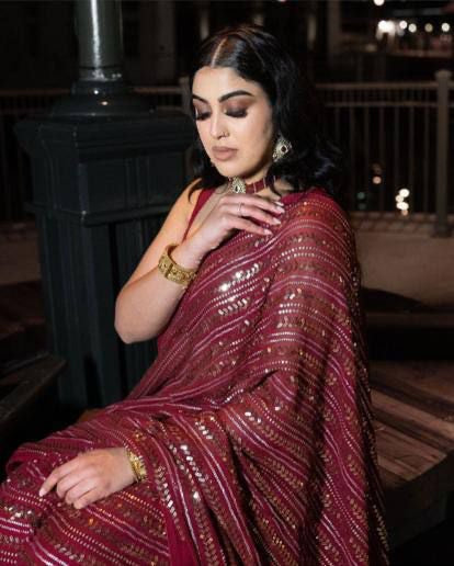 Bollywood style saree with fully stitched blouse and sequins work all over it