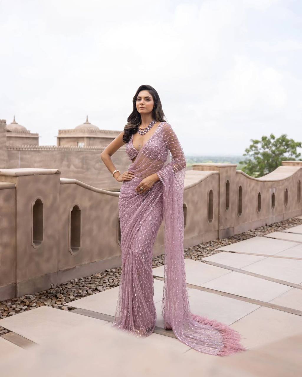 Baby pink bollywood style nirza designer saree with stitched blouse