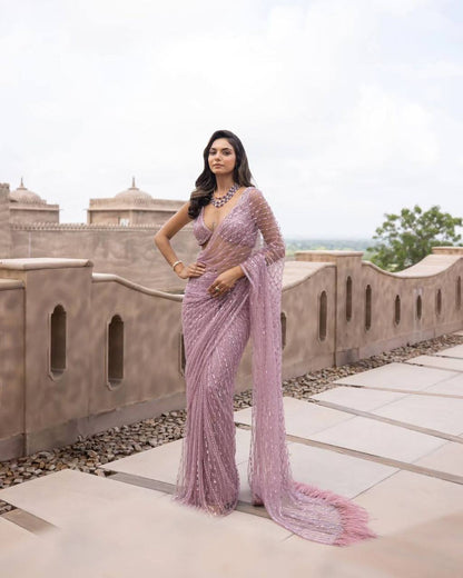 Baby pink bollywood style nirza designer saree with stitched blouse