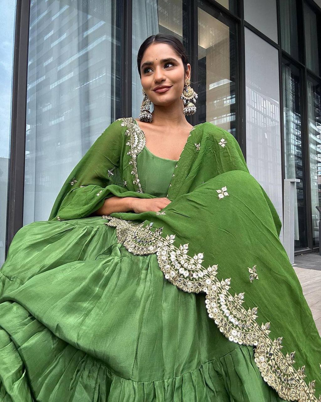 Green simple yet classic Anarkali suit