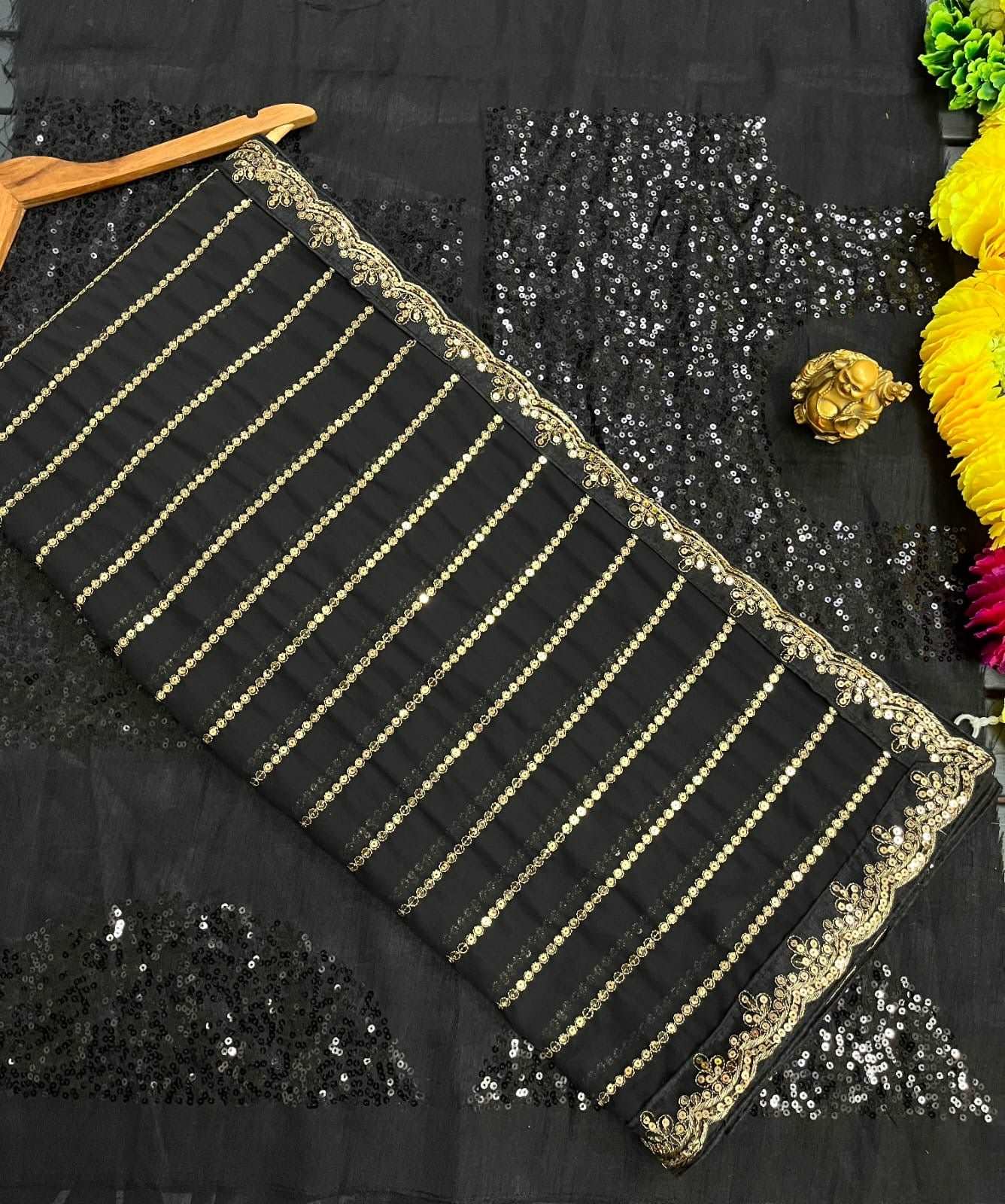 Full black and gold sequins stripe georgette saree with stitched blouse