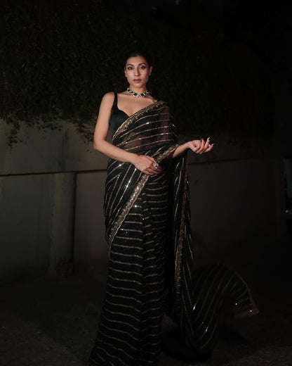 Full black and gold sequins stripe georgette saree with stitched blouse