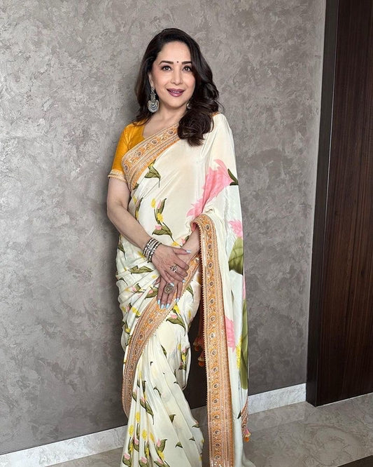 Bollywood Diva style floral pastel saree with beautiful border work and stitched blouse