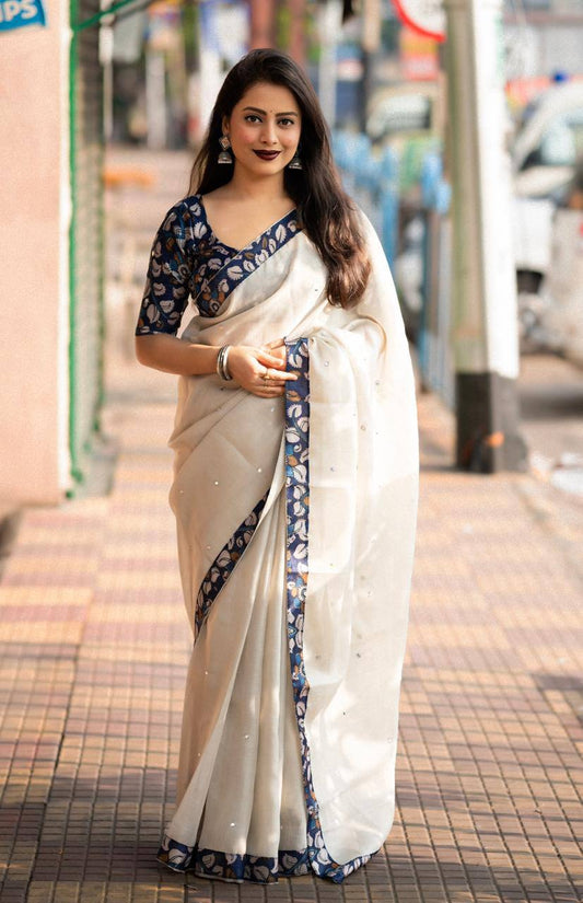 Grey linen saree with Jhumka and fully stitched blouse