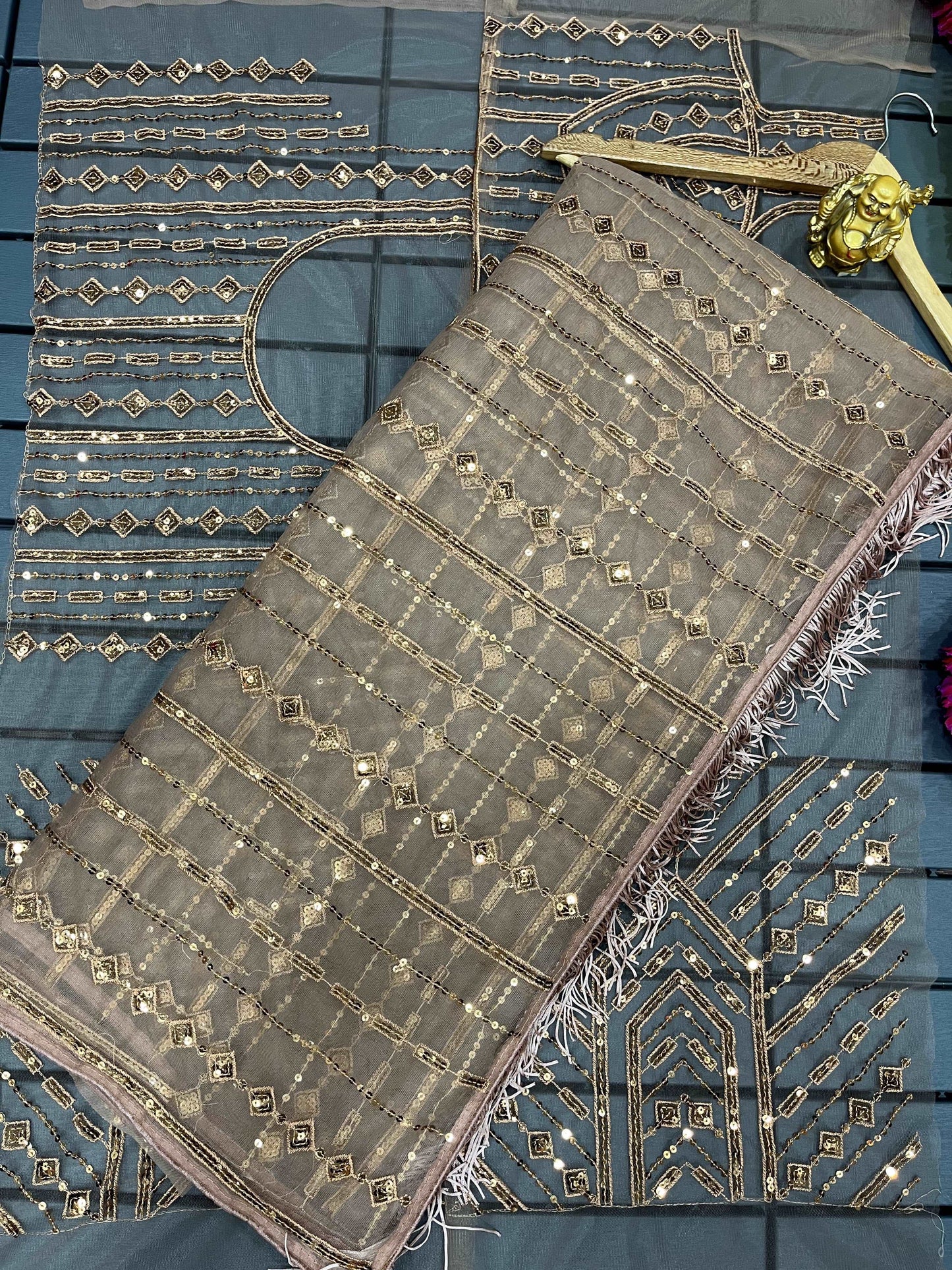 Brown peach shaded designer net saree with stitched blouse