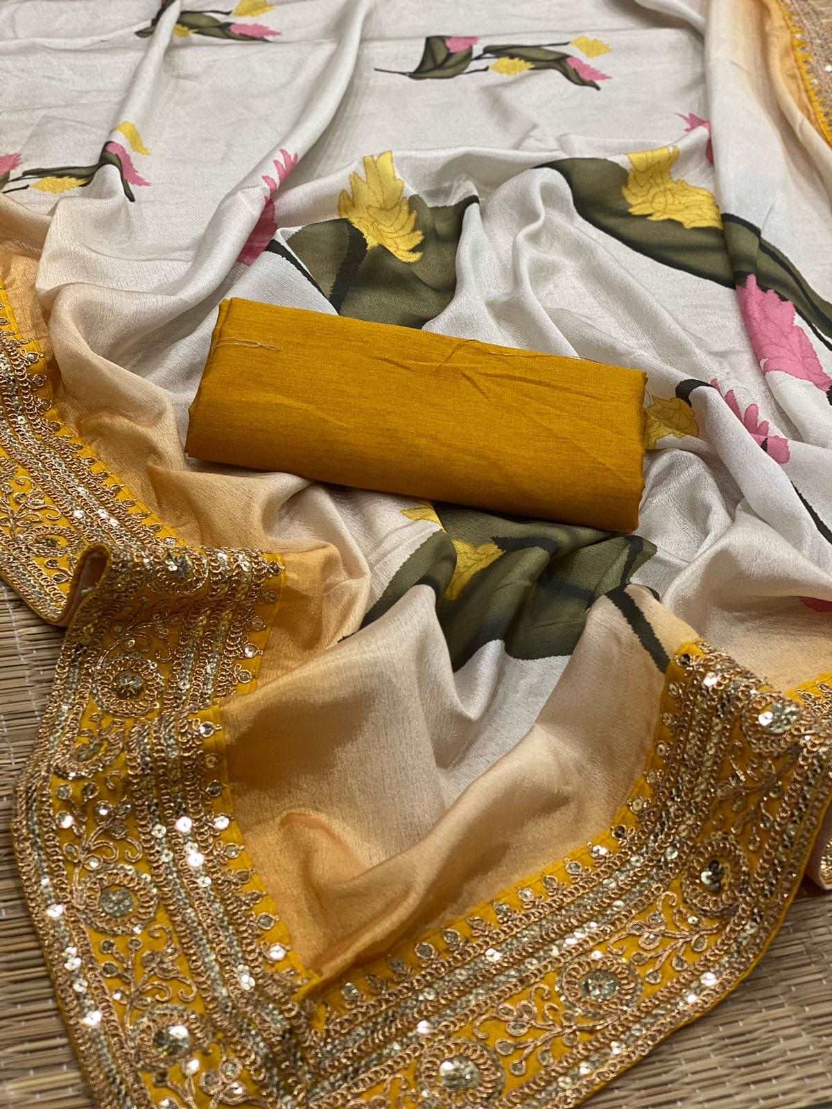 Bollywood Diva style floral pastel saree with beautiful border work and stitched blouse