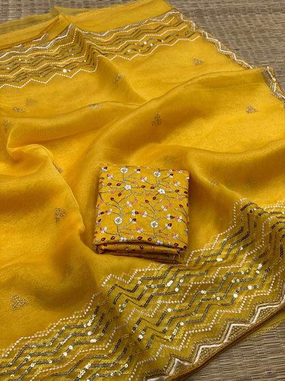 Mustard organza with sequins work celebrity style saree with stitched blouse