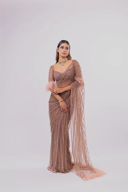 Brown peach shaded designer net saree with stitched blouse