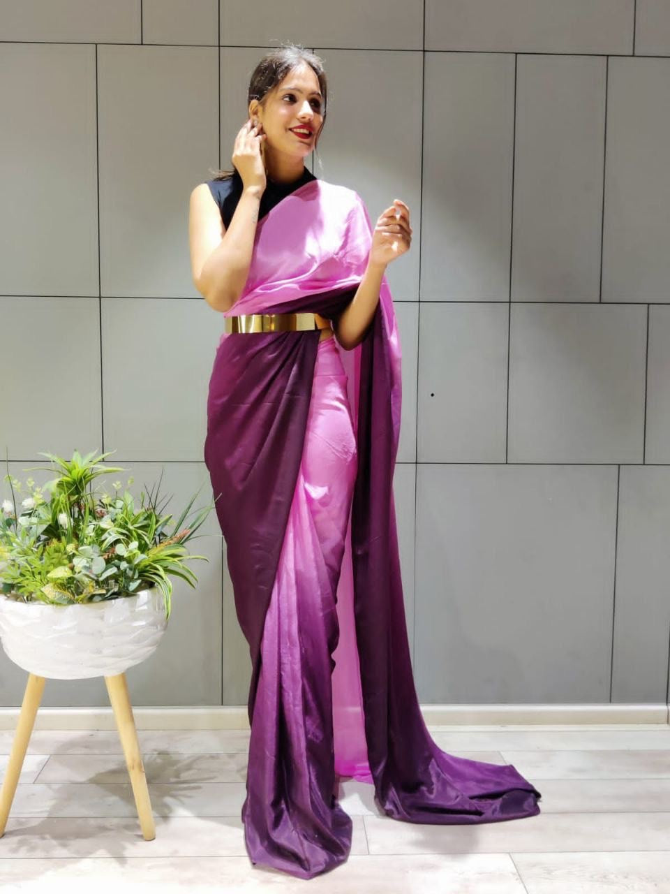 Party wear saree with gold belt and stitched blouse