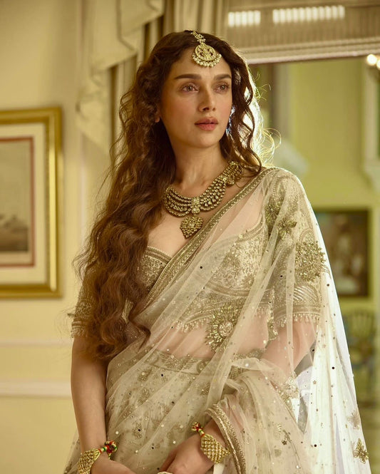 Aditi - Premium Silk Cream Heavy Embroidered Zari Lehenga Fully Stitched