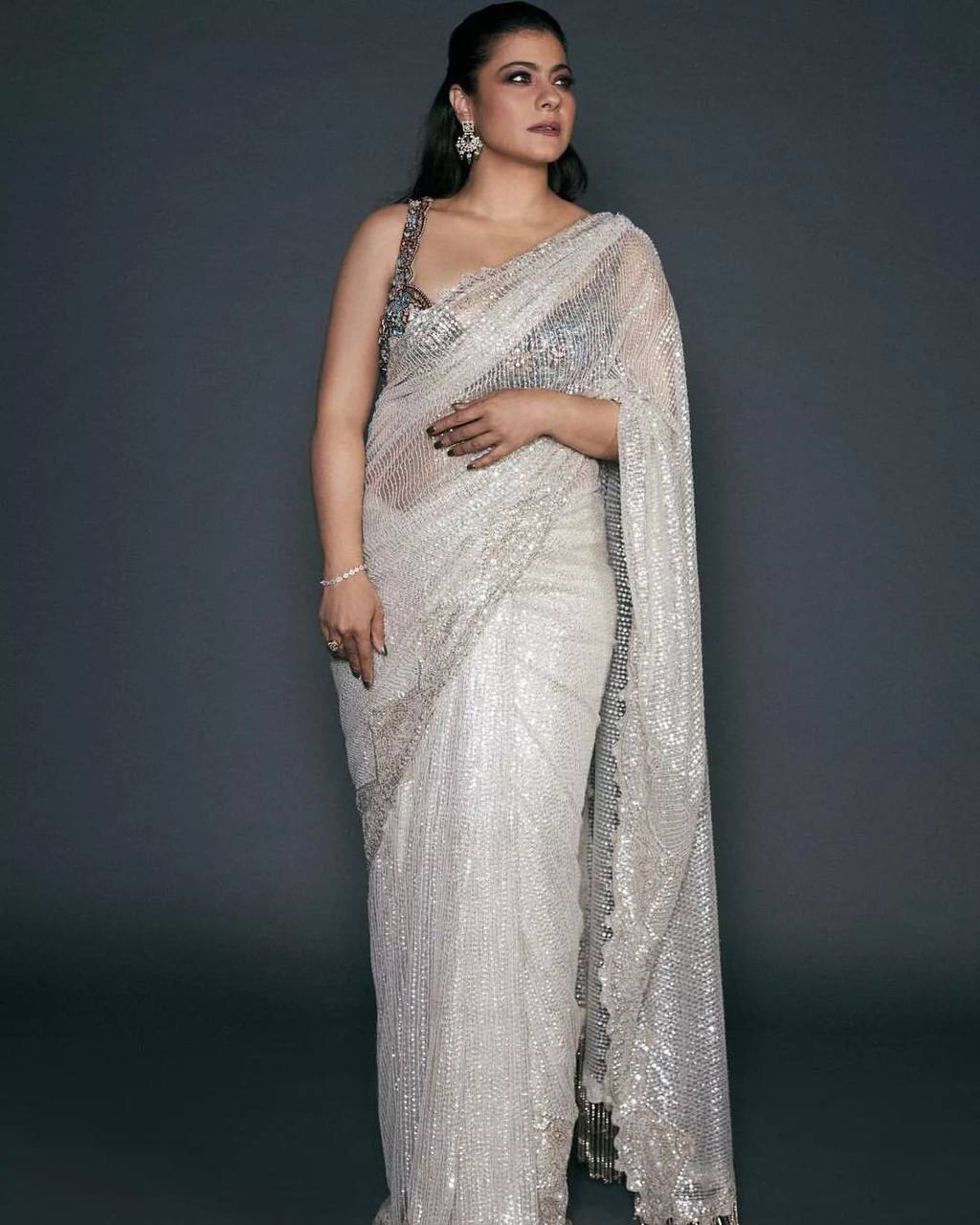 Premium white sequins saree with stitched blouse