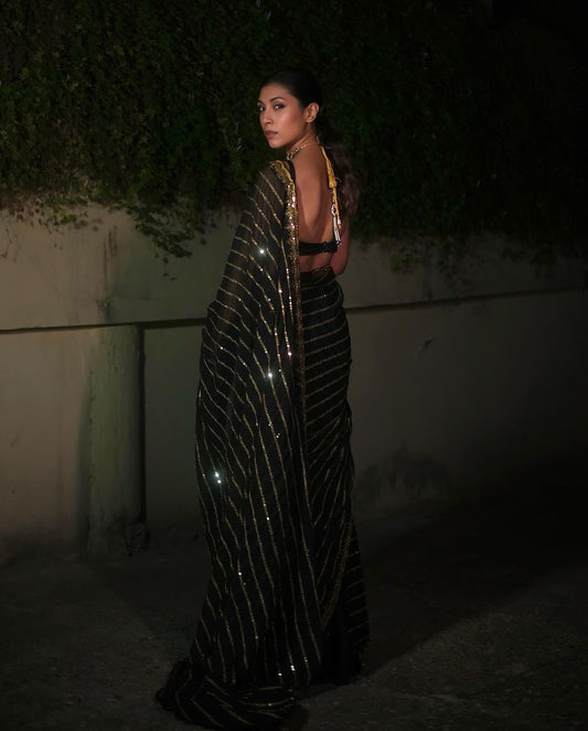 Full black and gold sequins stripe georgette saree with stitched blouse