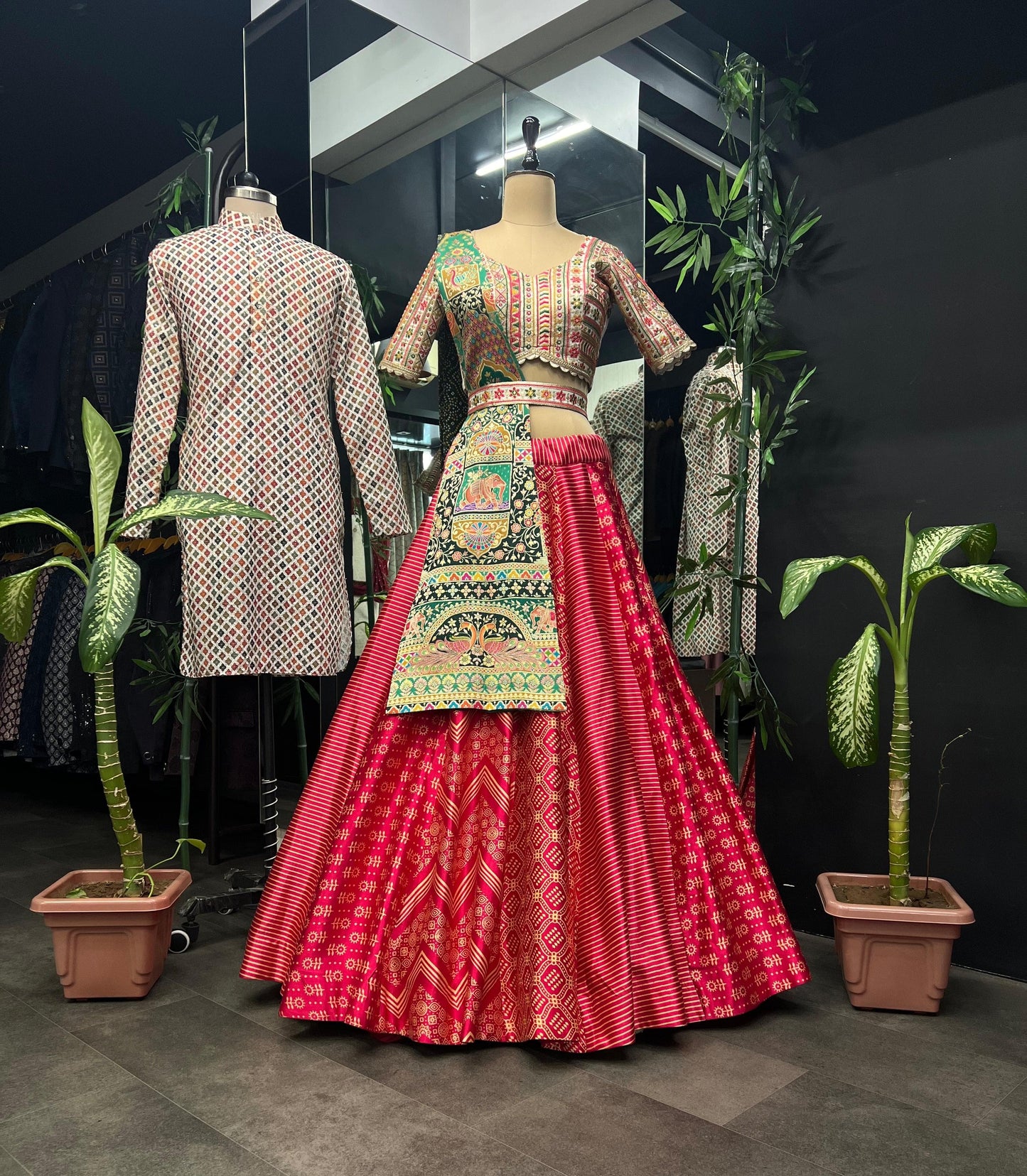 Vihangi - Red and green detailed print fully stitched lehenga
