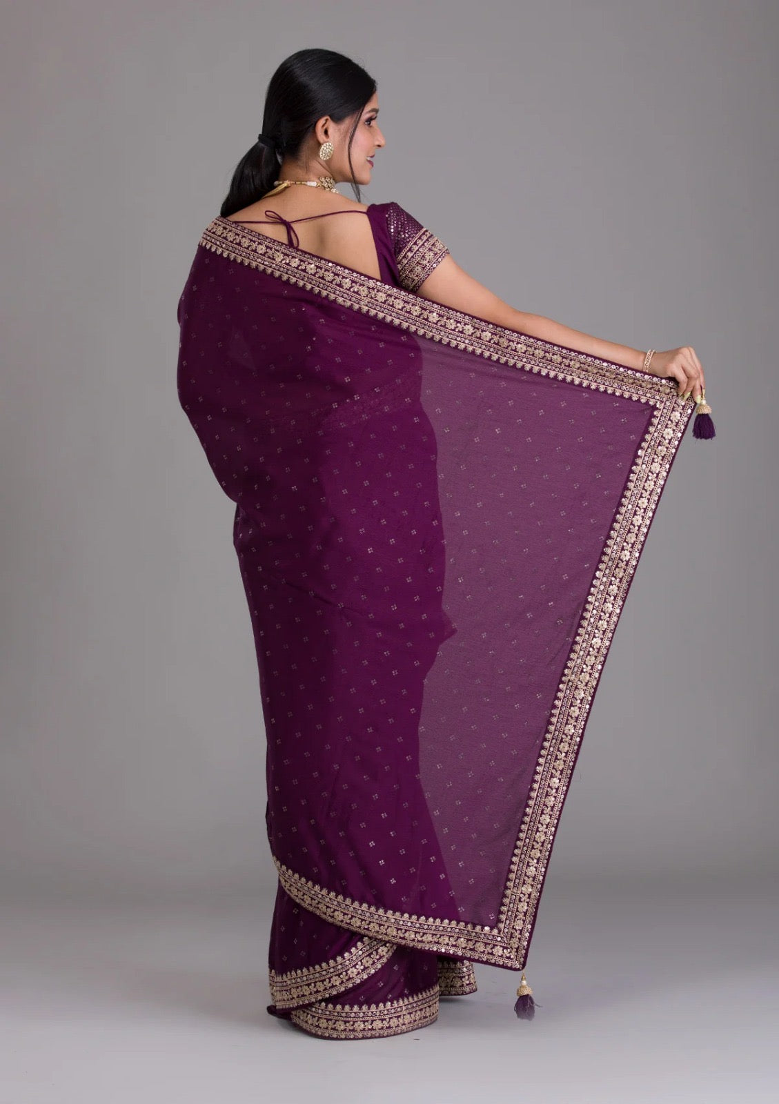 Chinnon wine colour saree with fully stitched blouse