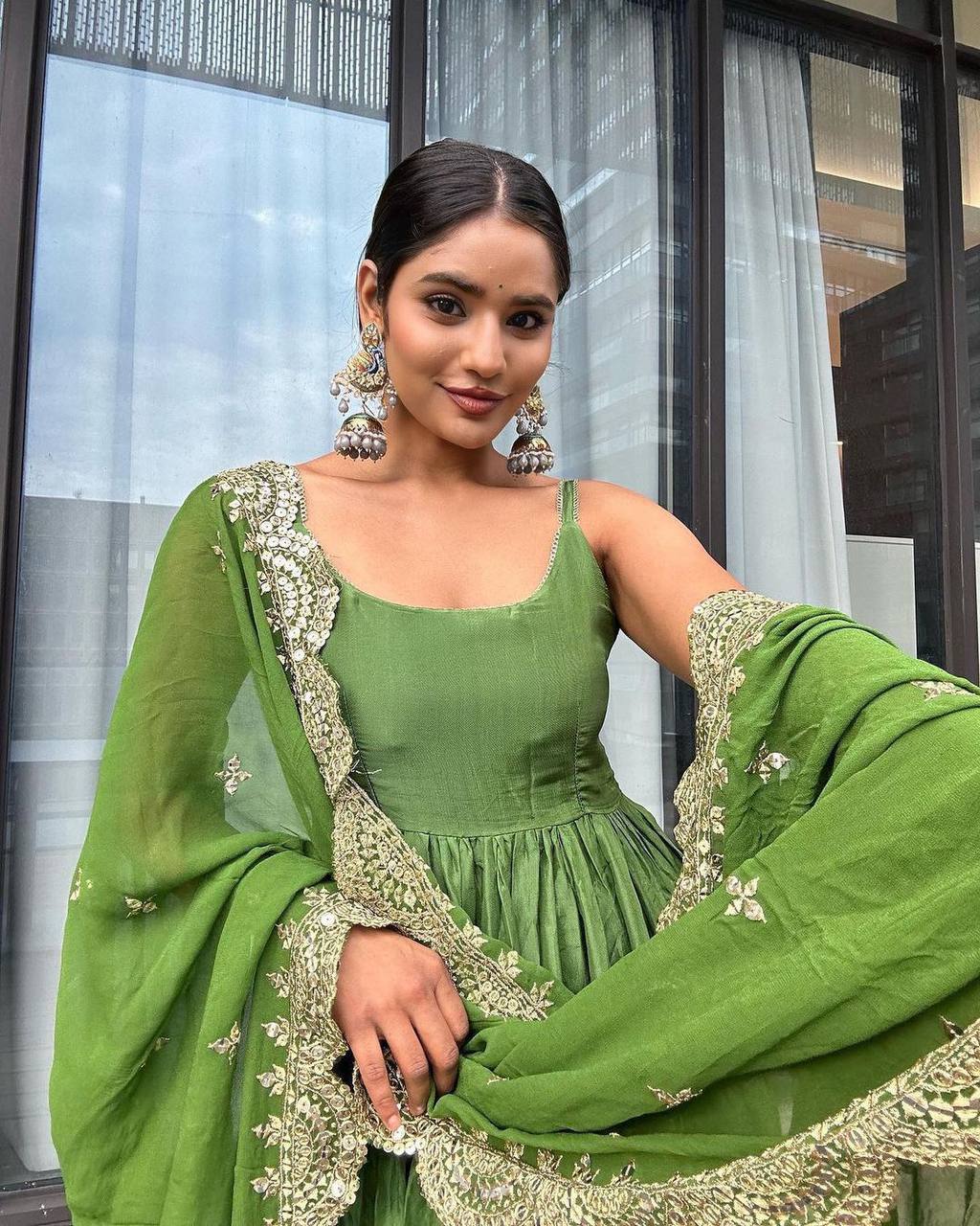 Green simple yet classic Anarkali suit