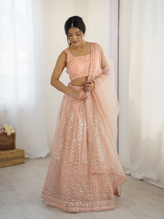 Kruti - Beautiful Pastel Peach Net Lehenga with Rainbow Sequins Fully Stitched