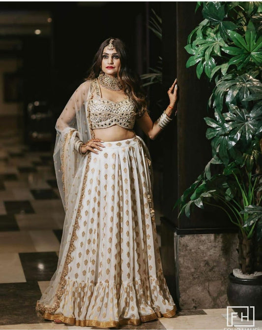 Banarasi lehenga with crosec lace border