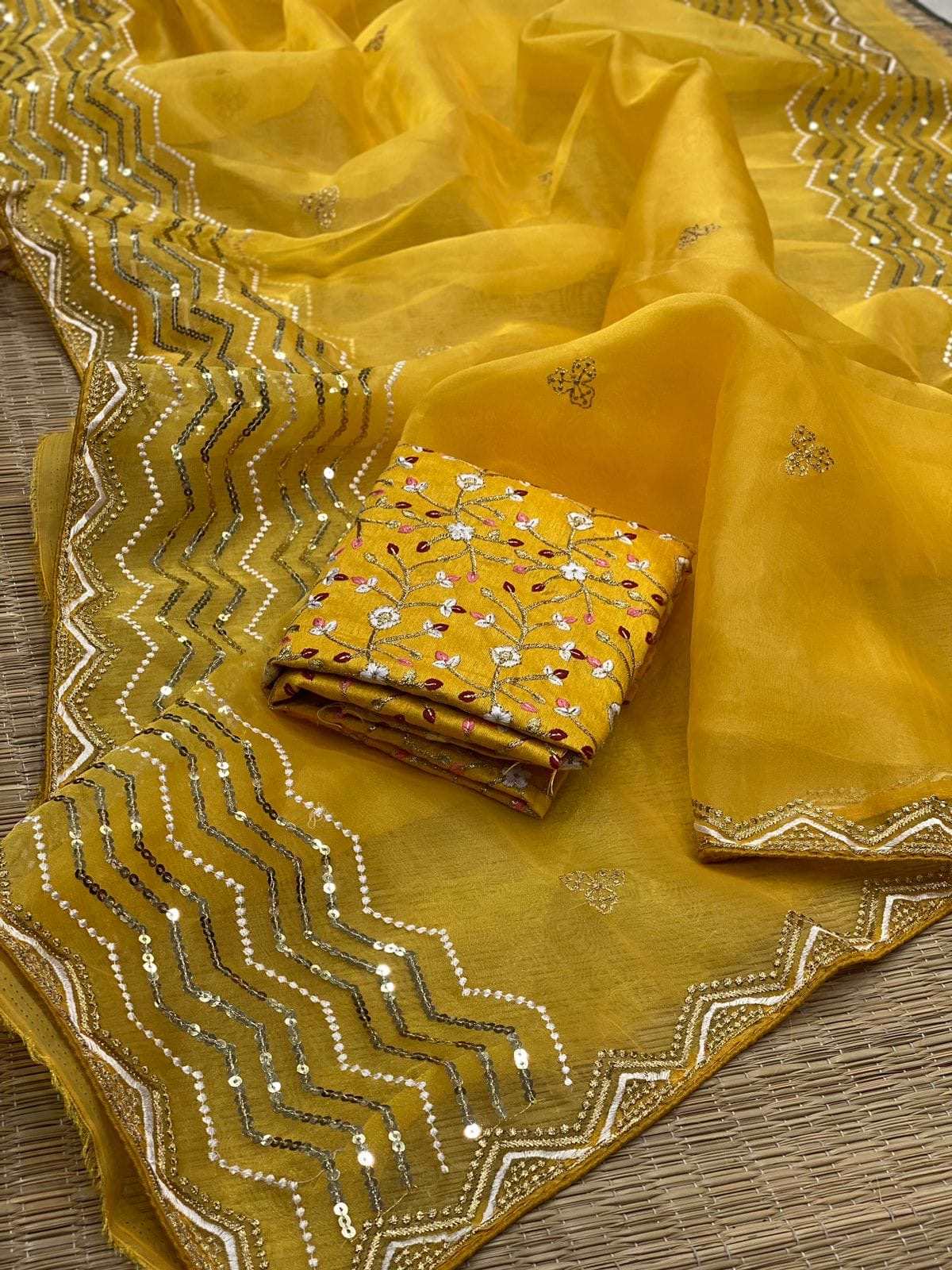 Mustard organza with sequins work celebrity style saree with stitched blouse