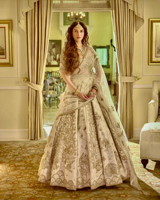 Aditi - Premium Silk Cream Heavy Embroidered Zari Lehenga Fully Stitched