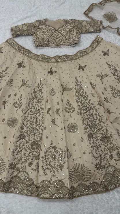 Aditi - Premium Silk Cream Heavy Embroidered Zari Lehenga Fully Stitched