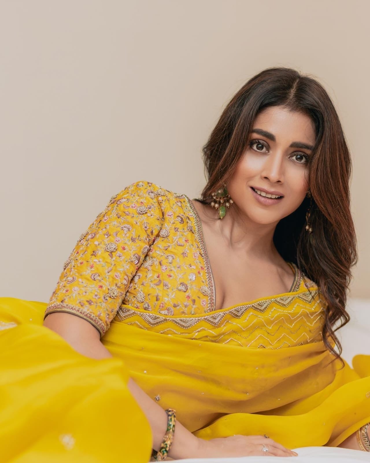 Mustard organza with sequins work celebrity style saree with stitched blouse