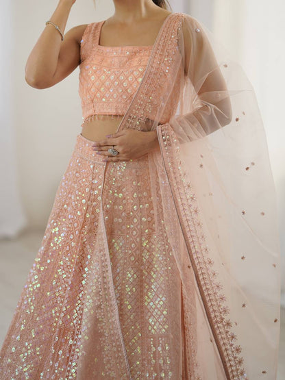 Kruti - Beautiful Pastel Peach Net Lehenga with Rainbow Sequins Fully Stitched