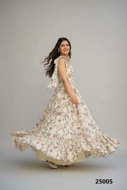 Woman in a floral dress standing by a pool with plants in the background